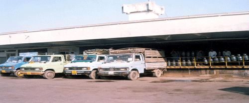 Milk Rout Vehicles Waiting for Unloading of Milk Cans at Dairy Dock 
